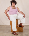 Miguel is wearing Tank Top in Lilac and vintage tee off-white Western Pants