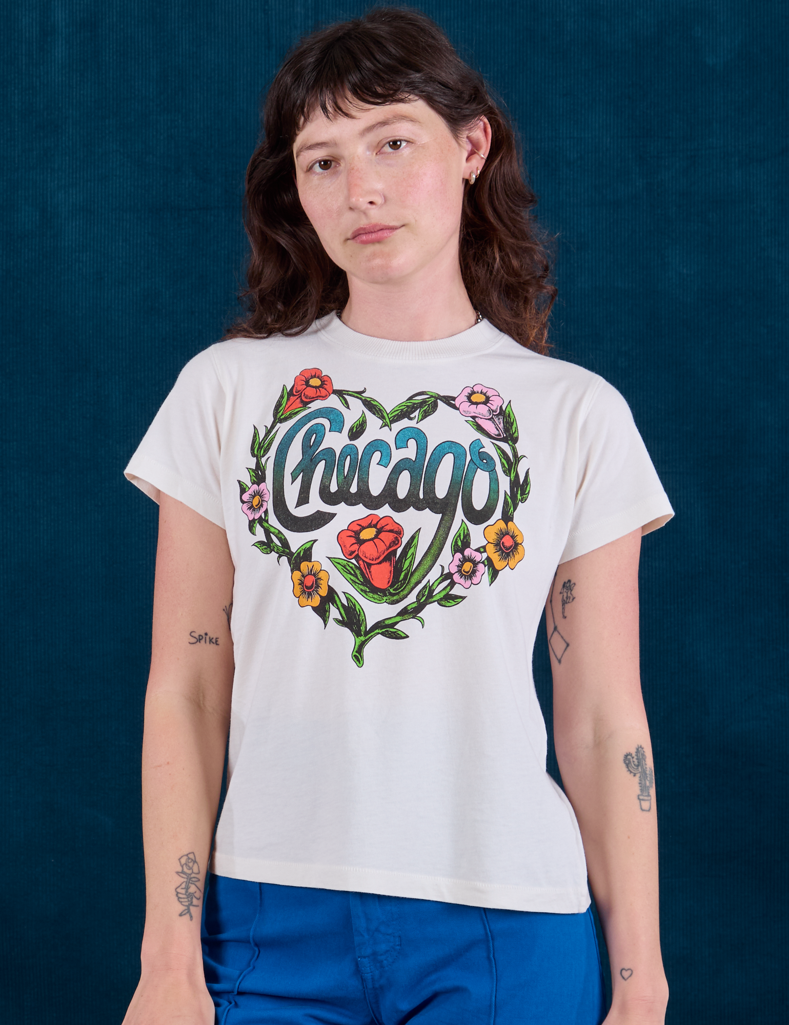 Alex is 5'8" and wearing P Chicago Tourist Tee