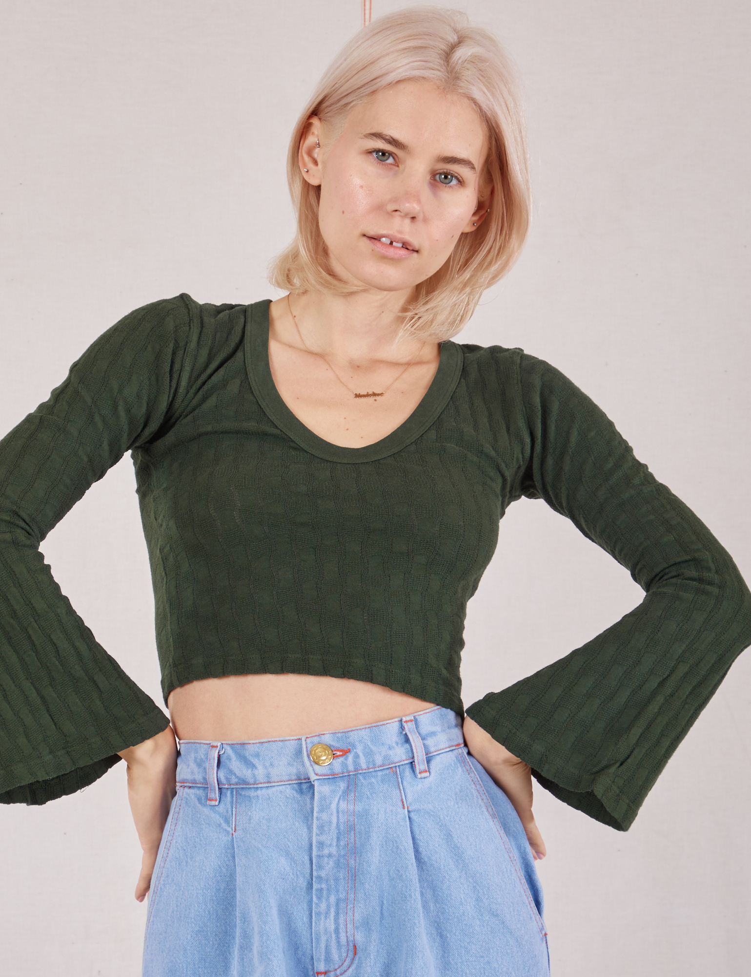 Madeline is 5&#39;9&quot; and wearing P Bell Sleeve Top in Swamp Green