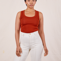 Mika is wearing size P Tank Top in Paprika paired with vintage off-white Western Pants
