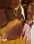 Long Sleeve Baby Tee in Honey Brown close up on Juliet