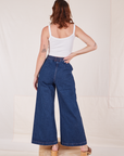 Back view of Indigo Wide Leg Trousers in Dark Wash and vintage off-white Cami