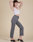 Side view of Work Pants in Washed Grey and Cropped Tank in Vintage Tee White on Alex