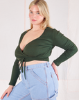 Wrap Top in Swamp Green angled front view on Lish