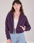 Alex is 5'8" and wearing P Cropped Zip Hoodie in Nebula Purple with a vintage off-white Cropped Tank underneath
