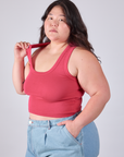 Cropped Tank Top in Hot Pink on Ashley tugging on one of the straps