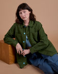 The Ripstop Field Coat in Evergreen is worn by Alex