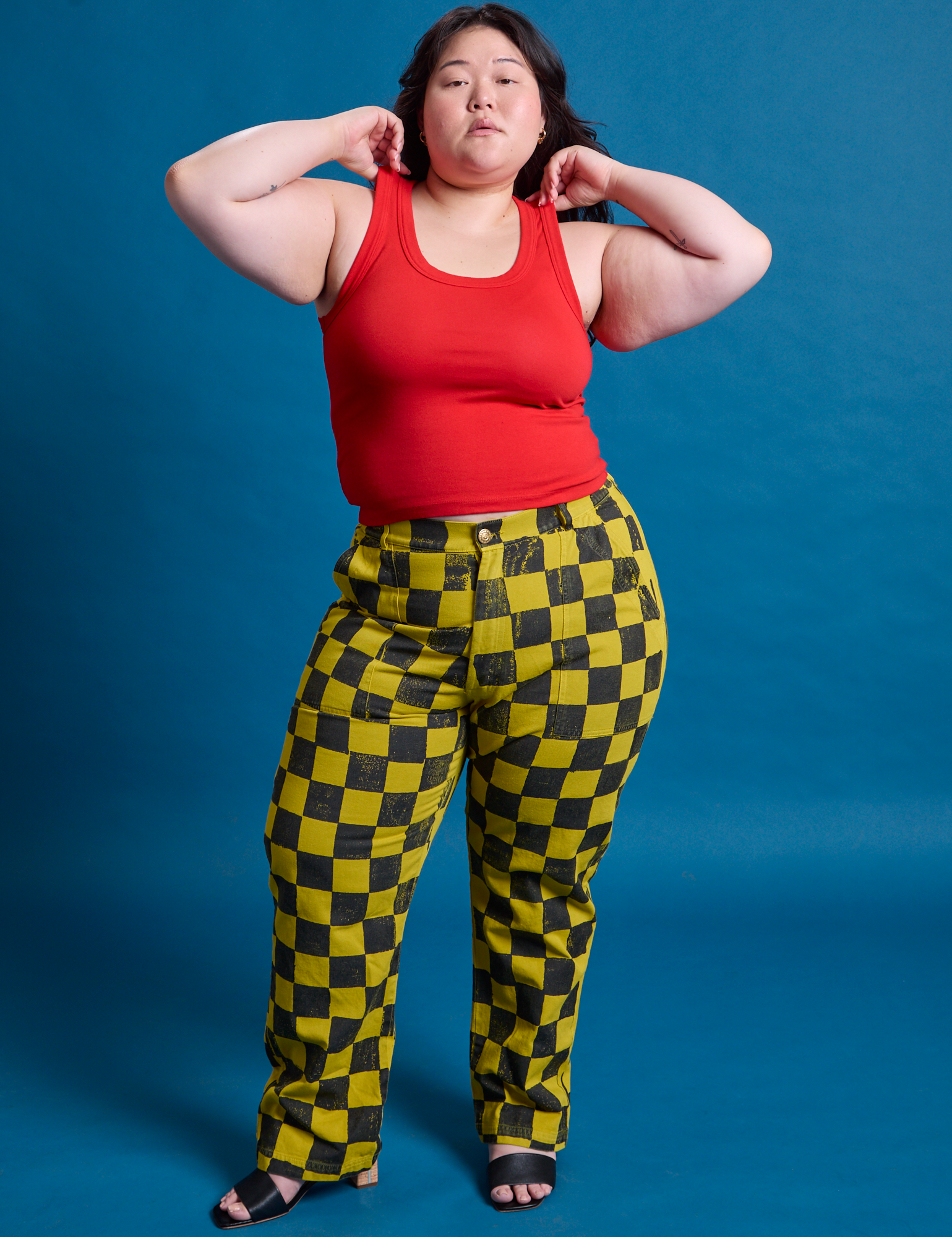 Checkerboard Work Pants in Yellow/Black and mustang red Tank Top on Ashley