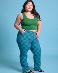 Angled front view of Checkerboard Work Pants in Blues and lawn green Cropped Tank on Ashley