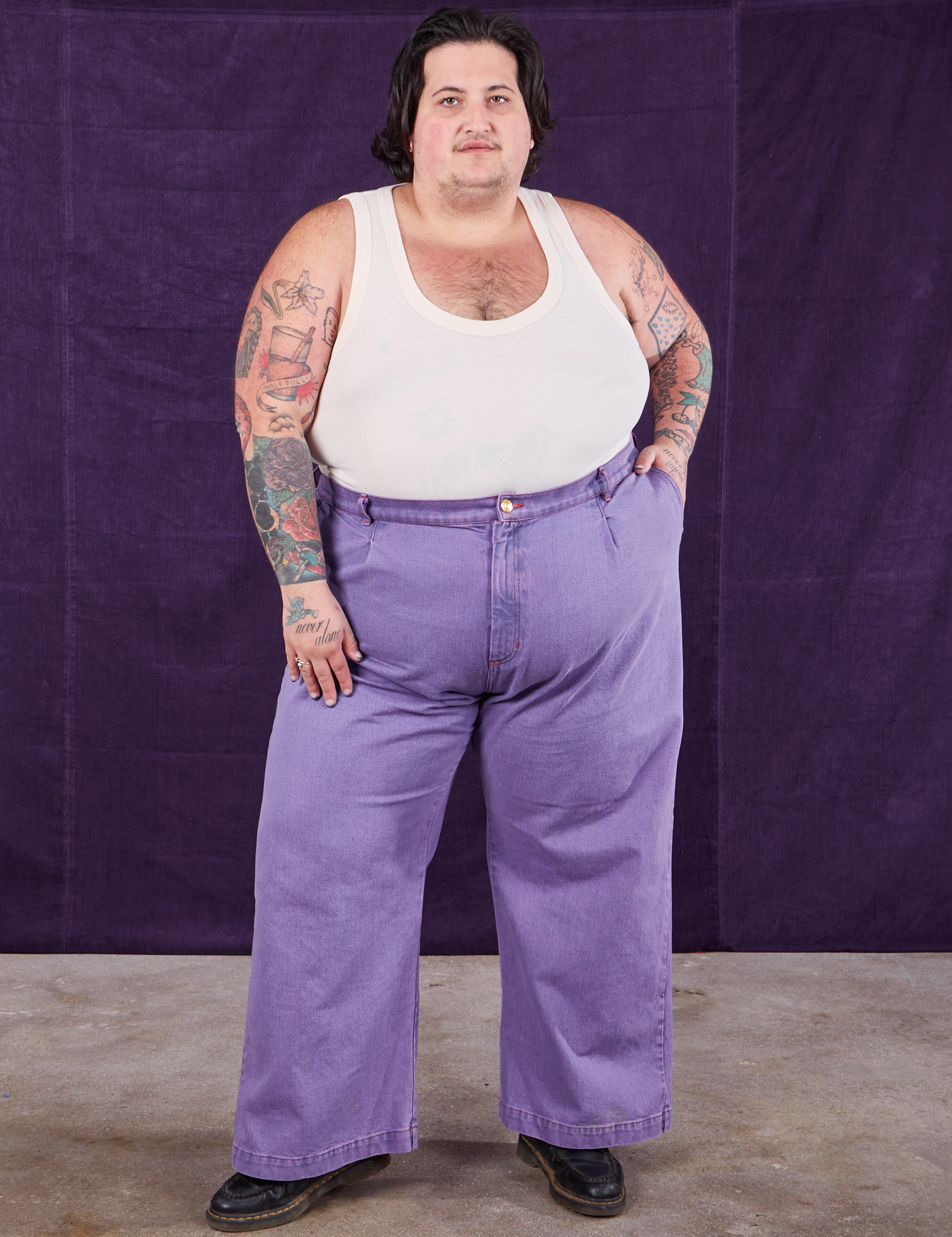 Sam is 5&#39;10&quot; and wearing 2XL Overdyed Wide Leg Trousers in Faded Grape and Tank Top in vintage tee off-white