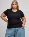 Juliet is 5'7" and wearing L Baby Tee in Basic Black