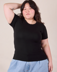 Ashley is 5'7" and wearing L Baby Tee in Vintage Basic Black