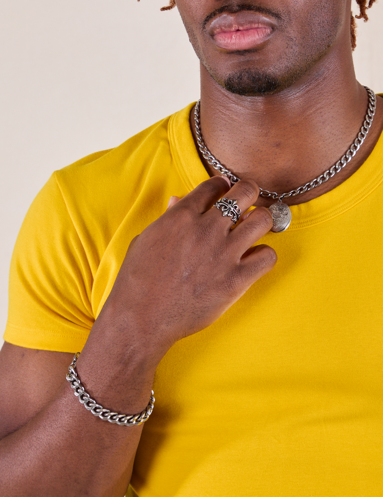 Baby Tee in Golden Yellow front close up on Isaac