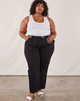 Morgan is 5'5" and wearing 3XL Work Pants in Black paired with a Tank Top in vintage tee off-white