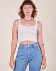 Alex is 5'8" and wearing P Cropped Cami in Vintage Tee Off-White worn with light wash Frontier Jeans