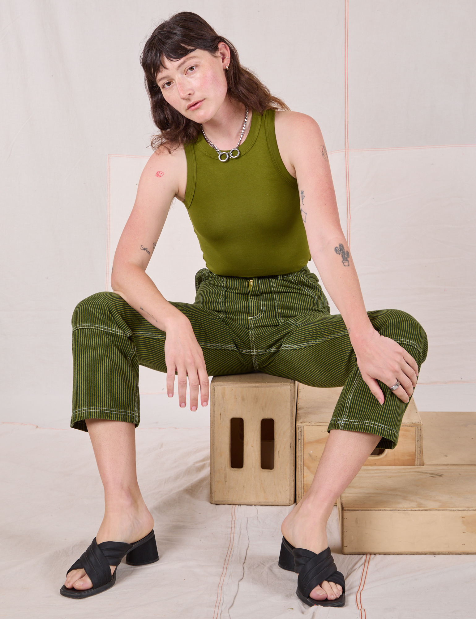 Railroad Carpenter Jeans in Summer Olive and summer olive Muscle Tee on Alex