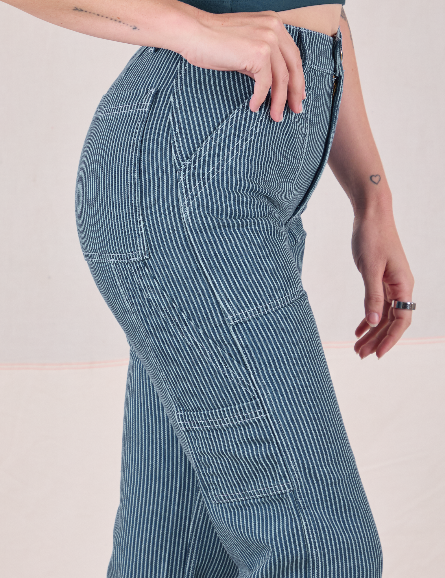 Railroad Carpenter Jeans in Baby Blue side view close up on Alex