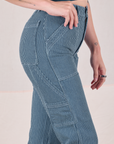 Railroad Carpenter Jeans in Baby Blue side view close up on Alex
