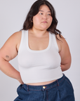 Ashley is 5'7" and wearing L Cropped Tank Top in Vintage Tee White