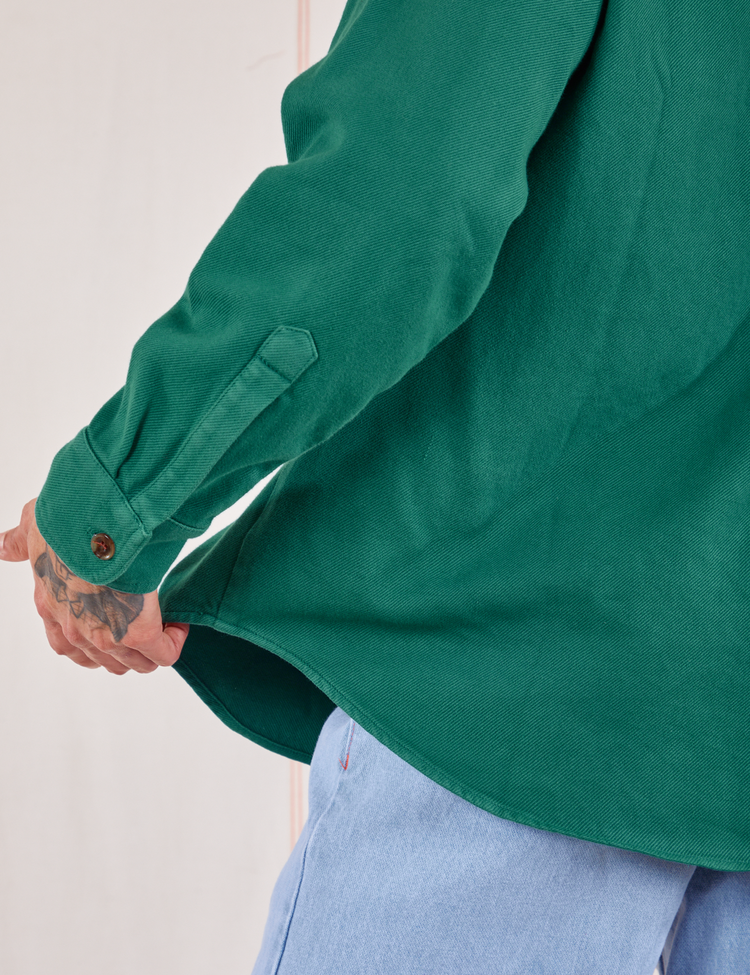 Bottom close up of Flannel Overshirt in Hunter Green on Jesse