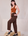 Side view of Overdyed Denim Trouser in Fudge and burnt terracotta Cropped Tank