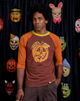 Jerrod is 6'3" and wearing M Raglan Tee in Jack-O-Lantern
