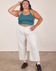 Alicia is wearing Halter Top in Marine Blue and vintage off-white Western Pants