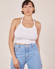 Tiara is 5'4" and wearing XS Halter Top in Vintage Tee Off-White paired with light wash Sailor Jeans
