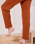 Rolled Cuff Sweat Pants in Burnt Terracotta pant leg close up on Alex
