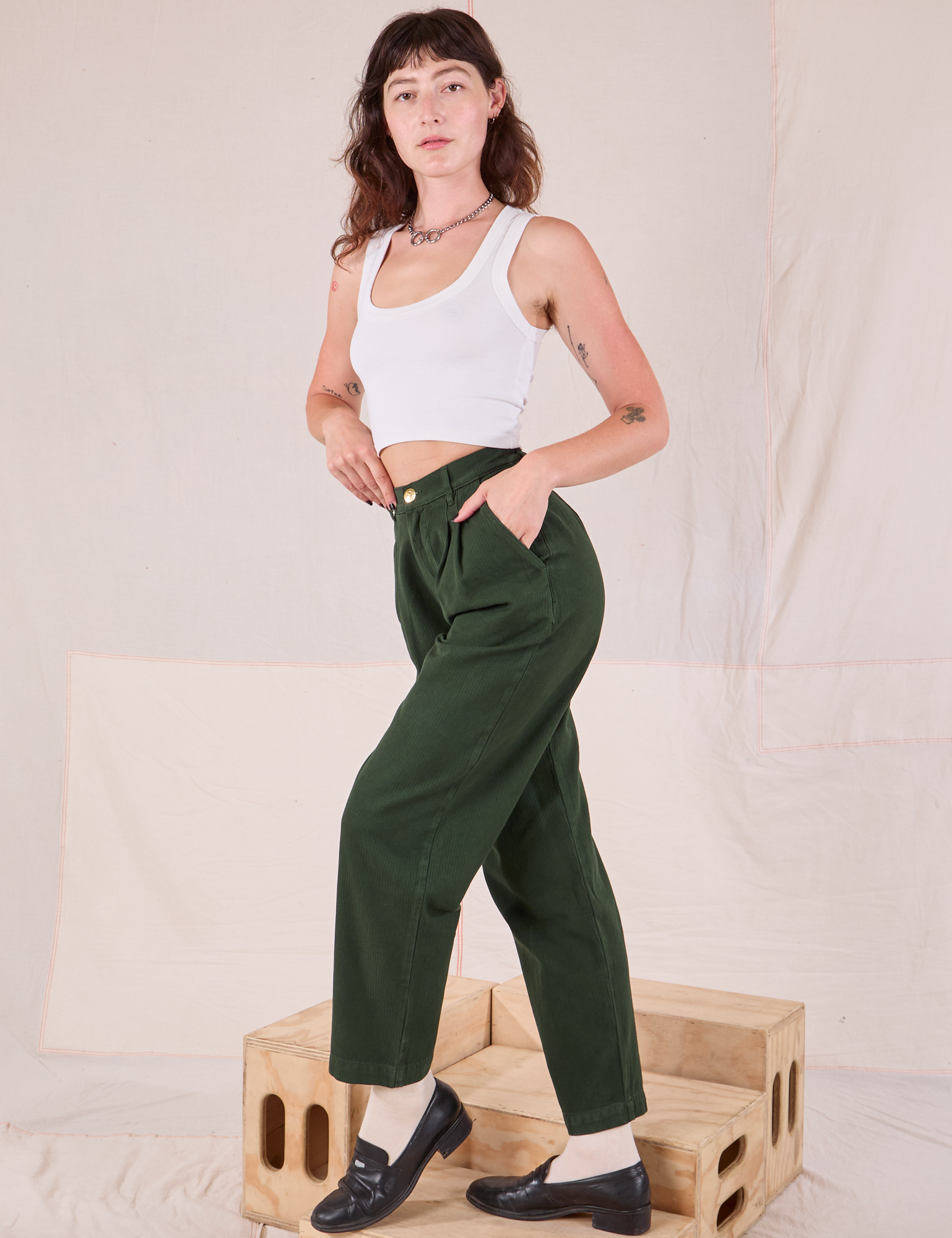 Heritage Trousers in Swamp Green angled view on Alex
