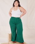 Ashley is wearing Bell Bottoms in Hunter Green and vintage off-white Halter Top