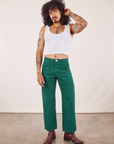 Jesse is 5'8" and wearing XS Work Pants in Hunter Green paired with Cropped Tank Top in vintage tee off-white