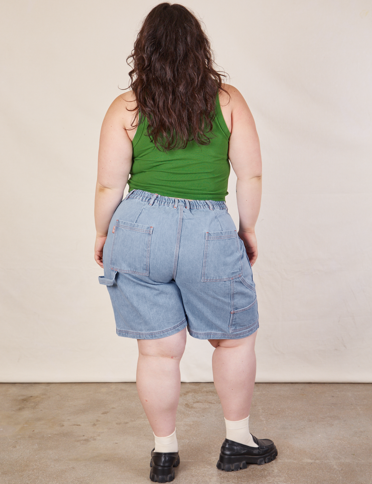 Carpenter Shorts in Light Wash back view on Ashley