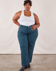 Morgan is wearing Work Pants in Lagoon and vintage tee off-white Tank Top