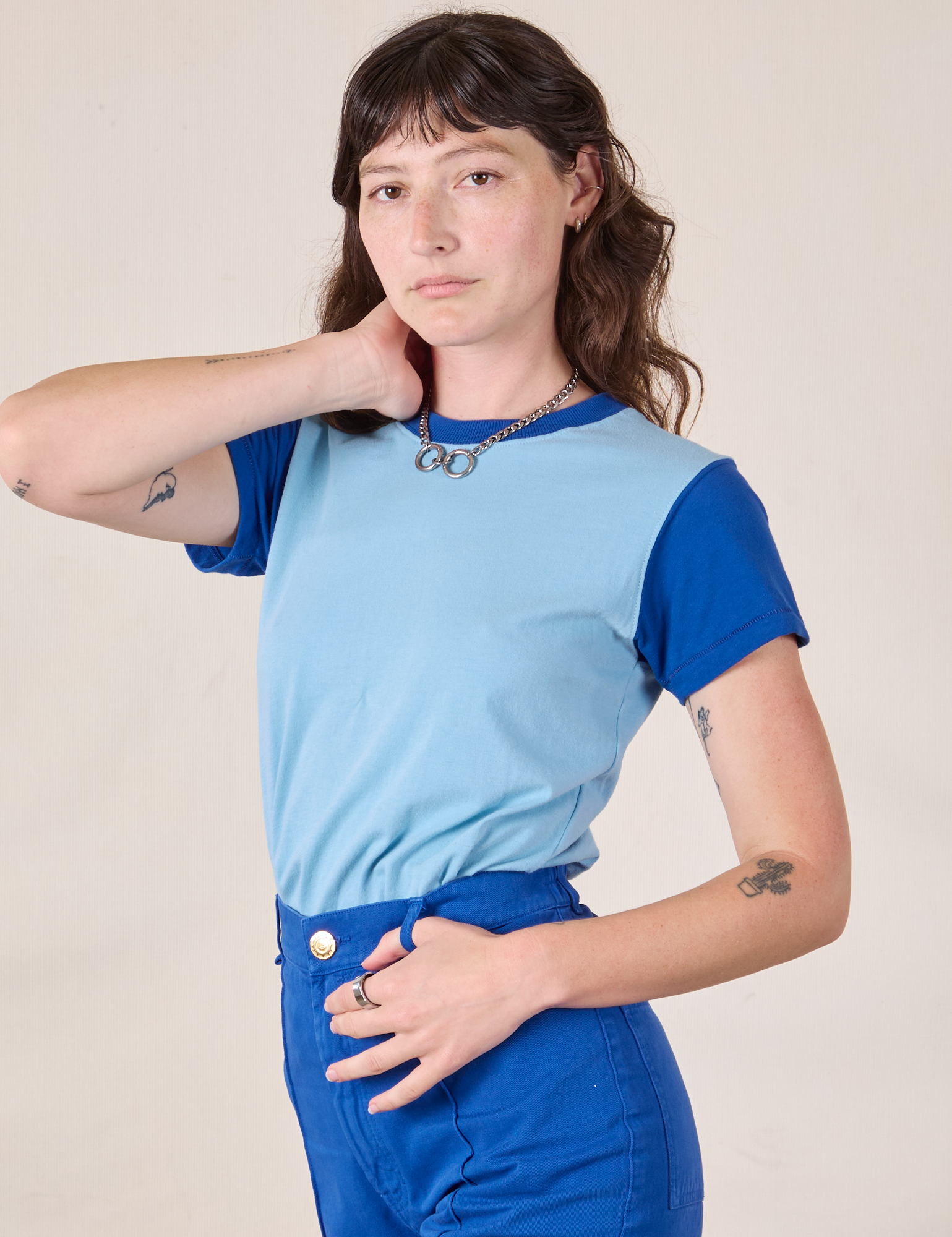 Mismatched Tee in Baby & Royal Blue angled front view on Alex