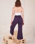 Back view of Bell Bottoms in Nebula Purple worn by Alex