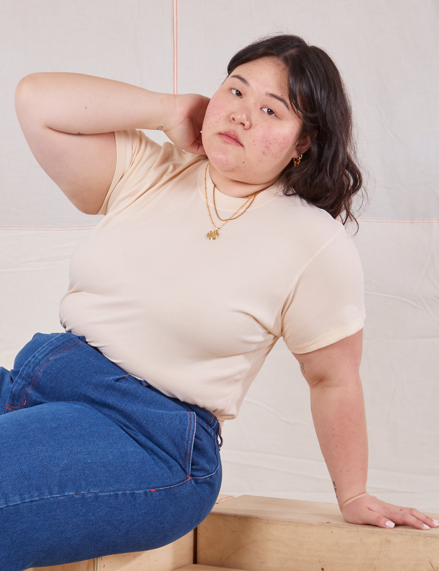 Ashley is wearing Organic Vintage Tee in Vintage Tee Off-White