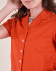 Pantry Button-Up in Chili Red front close up on Alex