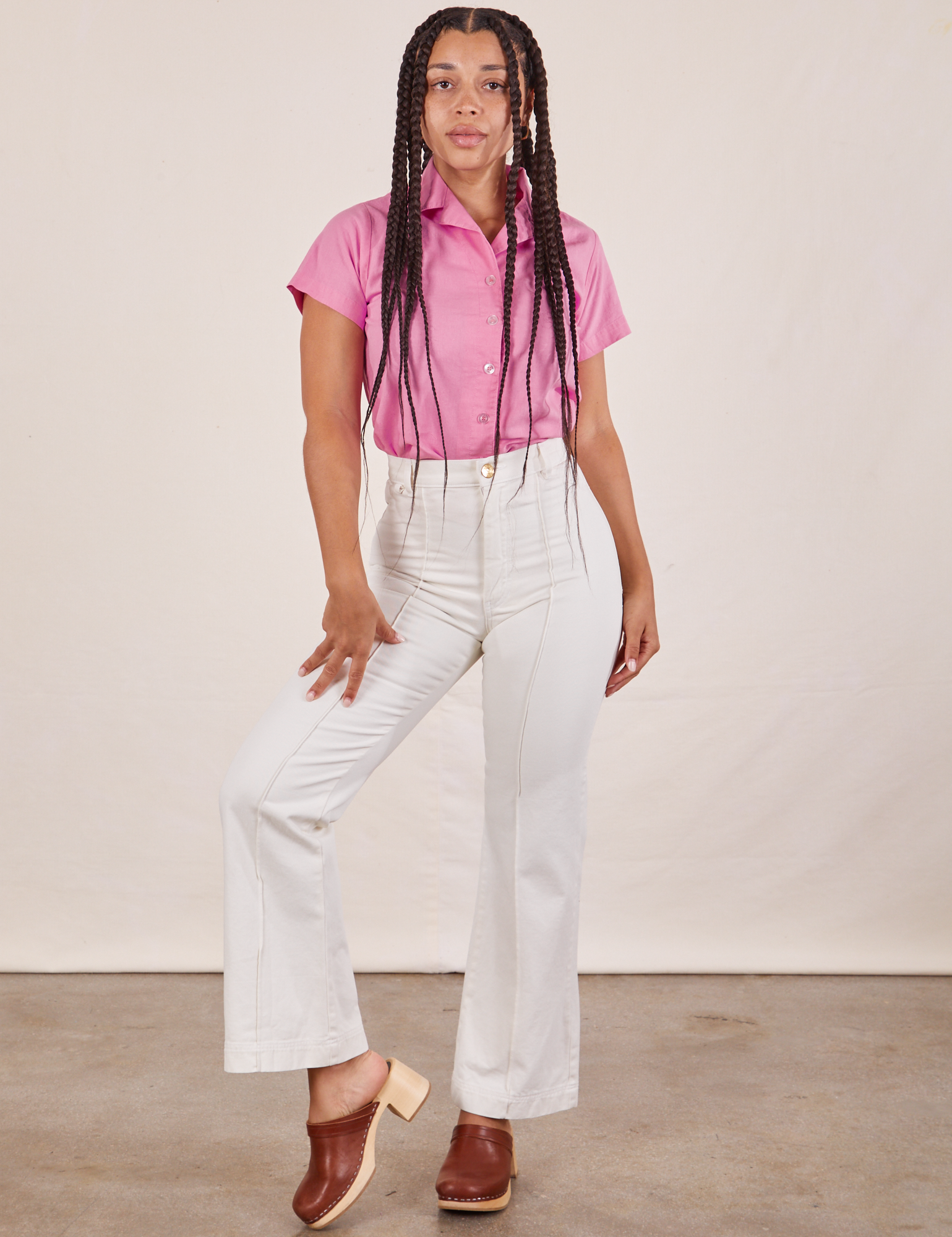 Gabi is wearing Pantry Button-Up in Bubblegum Pink and vintage Tee off-white Western Pants