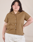 Ashley is 5'7" and wearing L Pantry Button-Up in Desert Brown