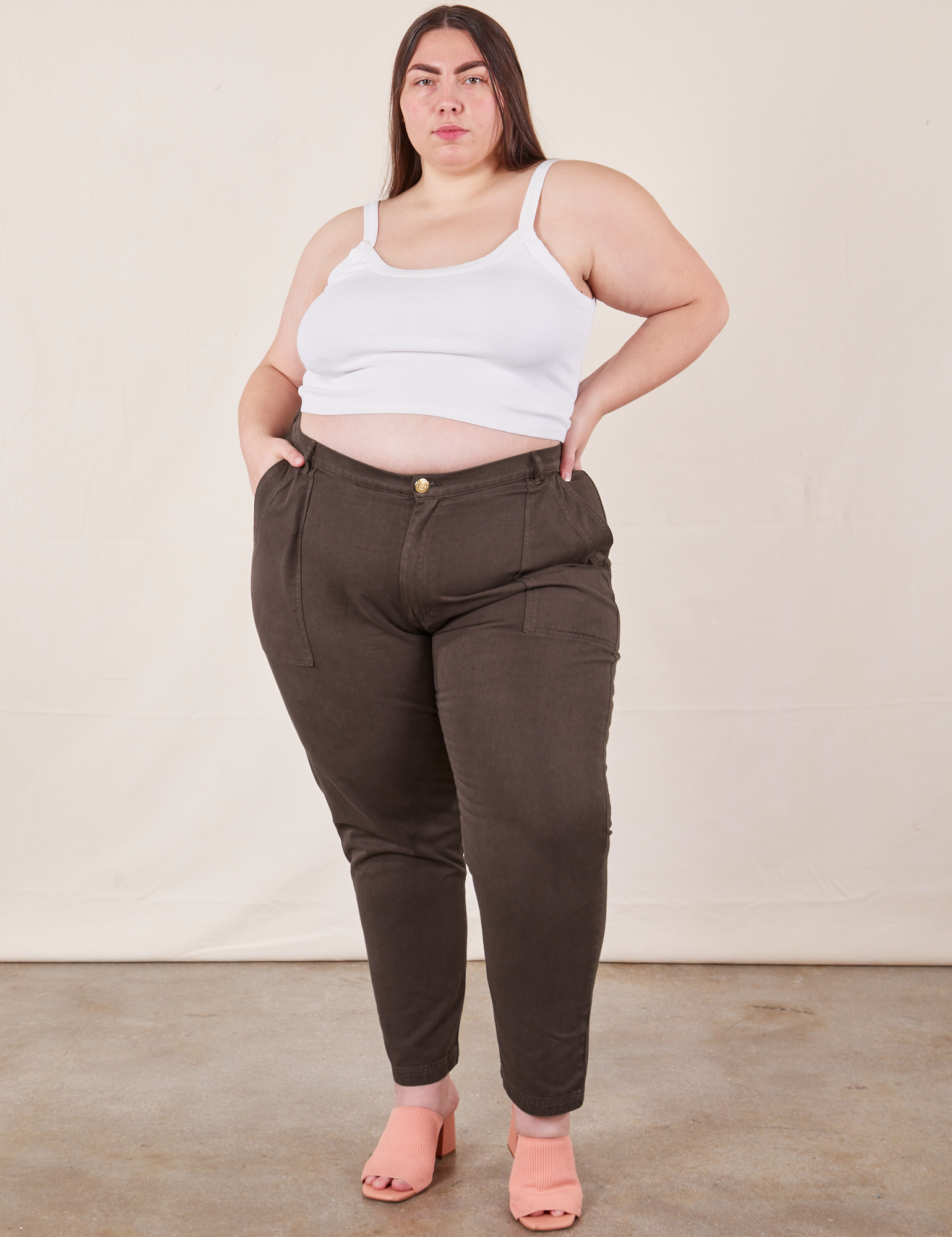 Marielena is 5&#39;8&quot; and wearing 2XL Pencil Pants in Espresso Brown Cropped Cami in vintage tee off-white