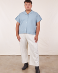 Miguel is wearing Pantry Button-Up in Periwinkle and vintage tee off-white Western Pants