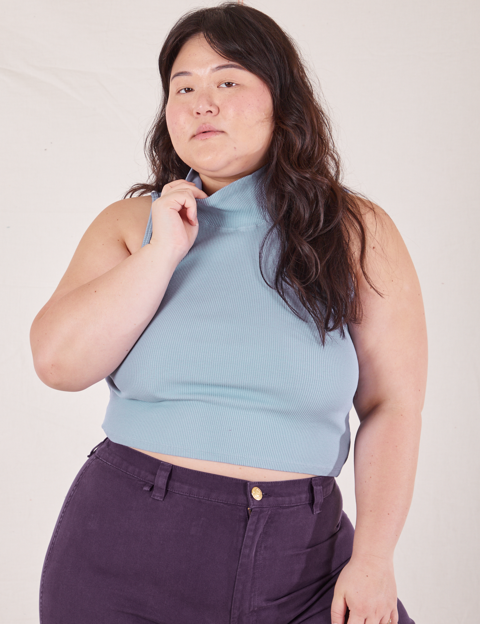 Ashley is 5&#39;7&quot; and wearing LSleeveless Essential Turtleneck in Periwinkle