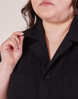 Collar close up of Petite Short Sleeve Jumpsuit in Basic Black on Ashley