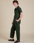 Side view of Short Sleeve Jumpsuit in Swamp Green on Quinn
