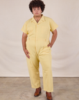Miguel is 6'0" and wearing 2XL Short Sleeve Jumpsuit in Butter Yellow