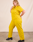 Short Sleeve Jumpsuit in Golden Yellow side view on Juliet