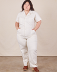 Ashley is 5'7" and wearing 1XL Short Sleeve Jumpsuit in Vintage Tee Off-White