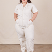 Ashley is 5'7" and wearing 1XL Short Sleeve Jumpsuit in Vintage Tee Off-White