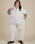 Sam is 5'10" and wearing 4XL Short Sleeve Jumpsuit in Vintage Tee White